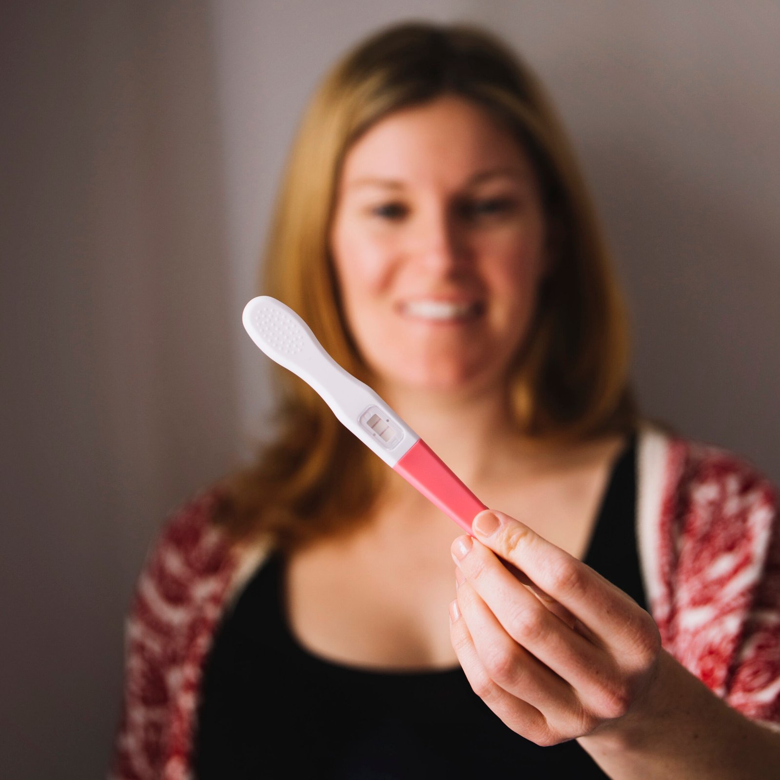 woman-looking-pregnancy-test